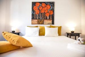 Letto o letti in una camera di Casa Melide Seeblick