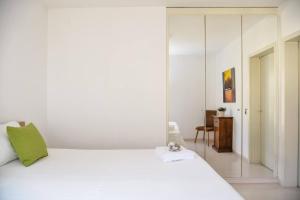 Letto o letti in una camera di Casa Melide Seeblick