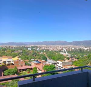 a view of a city from a balcony at Departamento Independencia in Tarija