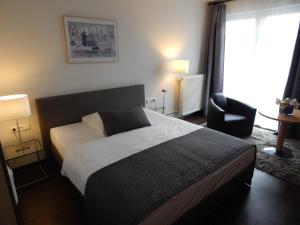 Postel nebo postele na pokoji v ubytování Hotel Schweizer Hof