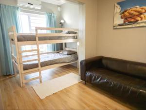 Postel nebo postele na pokoji v ubytování 25 ON Main Struisbaai