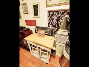 a table with a box on it in a room at Fall Room 3min From Yale, And Other Colleges in New Haven