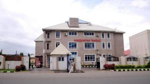 a building with a sign on the front of it at New Blue Diamond Hotel - rosebud in Jabi