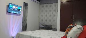Katil atau katil-katil dalam bilik di Agrable Appartement De 02 Pices Meuble