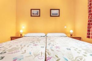 Posteľ alebo postele v izbe v ubytovaní Apartment near the beach, big terrace with nice sea views, wifi and parking