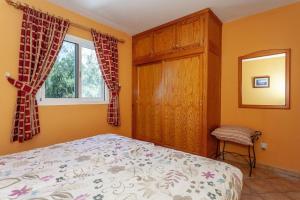 Posteľ alebo postele v izbe v ubytovaní Apartment near the beach, big terrace with nice sea views, wifi and parking