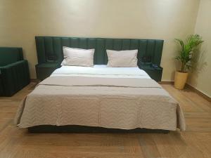 Ένα ή περισσότερα κρεβάτια σε δωμάτιο στο Wildlense Wild Retreat
