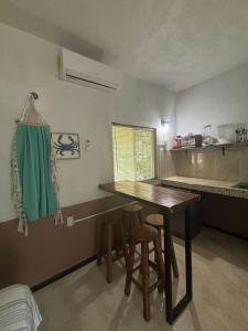 Kuchyň nebo kuchyňský kout v ubytování BACALAR INN Hotel