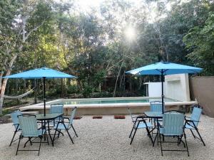 Bazén v ubytování BACALAR INN Hotel nebo v jeho okolí