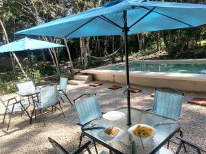 Bazén v ubytování BACALAR INN Hotel nebo v jeho okolí