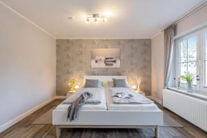 Postel nebo postele na pokoji v ubytování Ferienhaus Rose