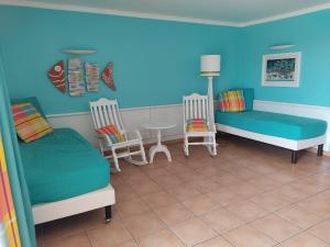 מיטה או מיטות בחדר ב-Exceptionnel T3 Vue Mer Village Vacances Sainte Luce