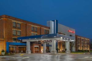 a brick building with a hospital at Hampton Inn West Des Moines Lake Drive in West Des Moines
