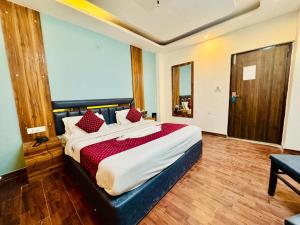 Postelja oz. postelje v sobi nastanitve Royal Residency Inn - Manali