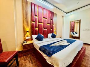 Postelja oz. postelje v sobi nastanitve Royal Residency Inn - Manali