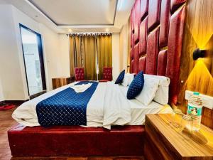 Postelja oz. postelje v sobi nastanitve Royal Residency Inn - Manali