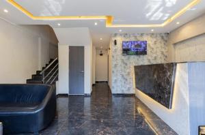 TV i/ili multimedijalni sistem u objektu Hotel Artilla Mumbai +31 fotografija