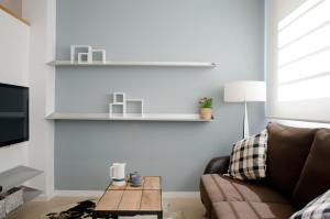 A television and/or entertainment centre at Casas Apartamentos Gracia
