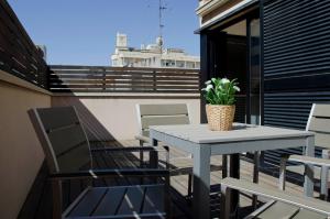 A balcony or terrace at Casas Apartamentos Gracia