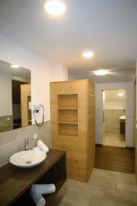 Koupelna v ubytování Hotel Ortler + 37 fotografií