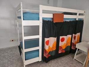 Ліжко або ліжка в номері Corralejo Coliving by Amazzzing Travel
