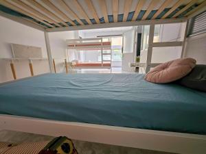 Ліжко або ліжка в номері Corralejo Coliving by Amazzzing Travel