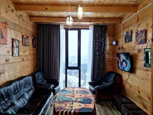 Prostor za sedenje u objektu Cottage SuBree on Goderdzi