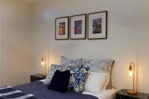 Ένα ή περισσότερα κρεβάτια σε δωμάτιο στο Omaroo High Country Retreat +28 φωτογραφίες