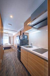 Kuchyň nebo kuchyňský kout v ubytování Apartment Hotel 11 Namba Minami 4