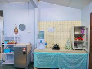 Kuchyň nebo kuchyňský kout v ubytování Udemie Homestay