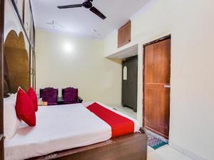 Voodi või voodid majutusasutuse Hotel O Smart View toas