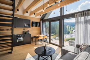 Kuchyňa alebo kuchynka v ubytovaní Panorama Lofts Pec