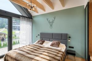 Posteľ alebo postele v izbe v ubytovaní Panorama Lofts Pec