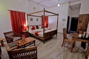 Voodi või voodid majutusasutuse Satyam Palace Resort toas