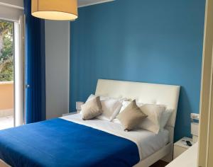 Postel nebo postele na pokoji v ubytování B&B e Apartment MARIA VITTORIA - Anzio Blue Horizon - 150 mt dal mare
