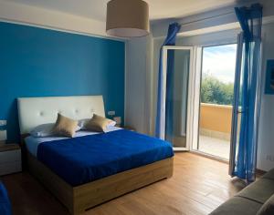 Postel nebo postele na pokoji v ubytování B&B e Apartment MARIA VITTORIA - Anzio Blue Horizon - 150 mt dal mare