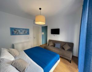 Postel nebo postele na pokoji v ubytování B&B e Apartment MARIA VITTORIA - Anzio Blue Horizon - 150 mt dal mare