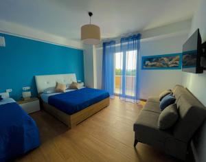 Postel nebo postele na pokoji v ubytování B&B e Apartment MARIA VITTORIA - Anzio Blue Horizon - 150 mt dal mare