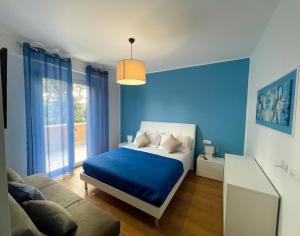 Postel nebo postele na pokoji v ubytování B&B e Apartment MARIA VITTORIA - Anzio Blue Horizon - 150 mt dal mare