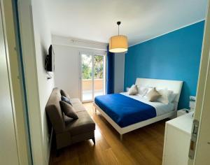 Postel nebo postele na pokoji v ubytování B&B e Apartment MARIA VITTORIA - Anzio Blue Horizon - 150 mt dal mare