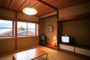 โทรทัศน์และ/หรือระบบความบันเทิงของ Country Inn Kashiwabara +61 ภาพ