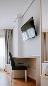 TV a/nebo společenská místnost v ubytování Hotel Bahia Sur