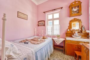 Ένα ή περισσότερα κρεβάτια σε δωμάτιο στο Waterfront House Pedi