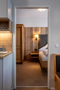 Postel nebo postele na pokoji v ubytování Aparthotel Stadler