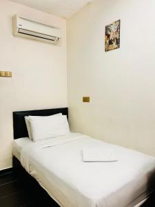 Postel nebo postele na pokoji v ubytování DS Hotel