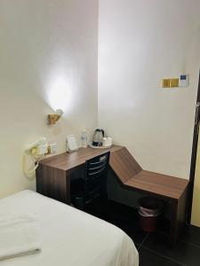 Postel nebo postele na pokoji v ubytování DS Hotel