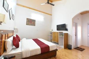TV a/nebo společenská místnost v ubytování Rainbow Resorts