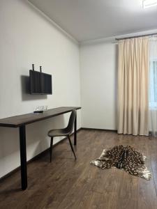 TV a/nebo společenská místnost v ubytování Imperial Hotel