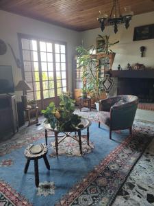a living room with a couch and a table at CASA DI SIGNARE in Ventiseri