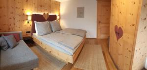 Postel nebo postele na pokoji v ubytování Ferienhaus Sigrid
